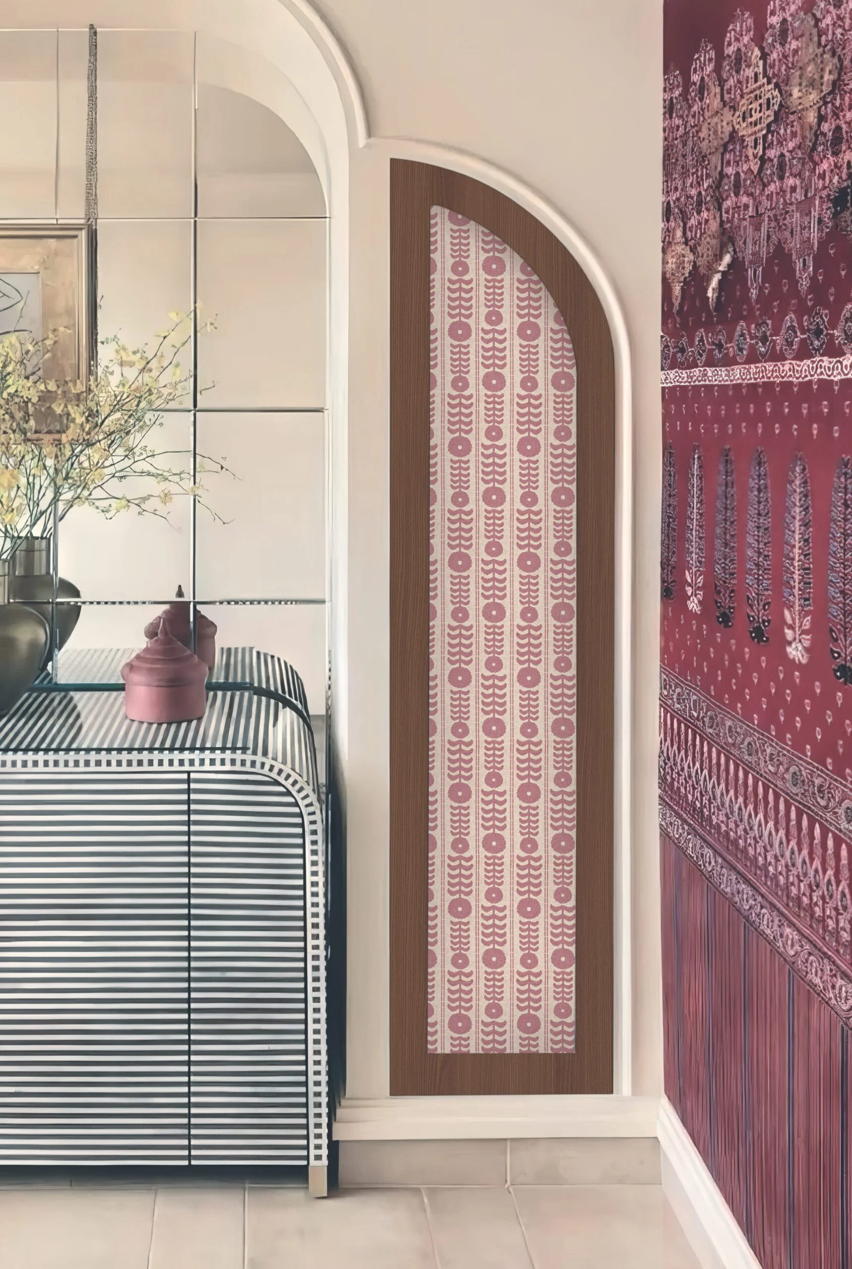 Eclectic interior with a striped console, mirrored wall, and patterned wallpaper panels.