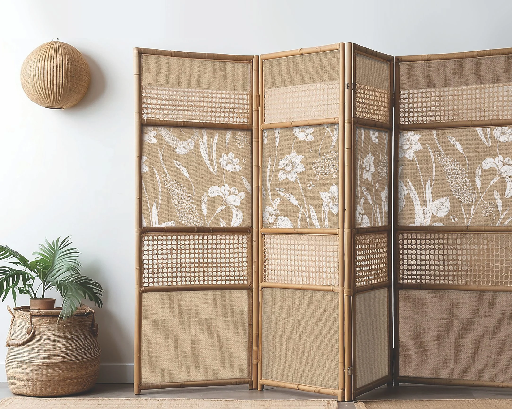 Bamboo room divider with floral panels and woven textures against a white wall.