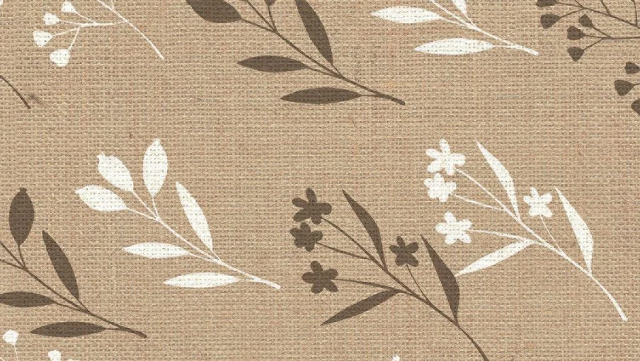 Brown burlap fabric with a white and dark brown botanical leaf and flower pattern.