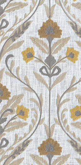 Yellow and grey floral patterns on a white textured fabric background.