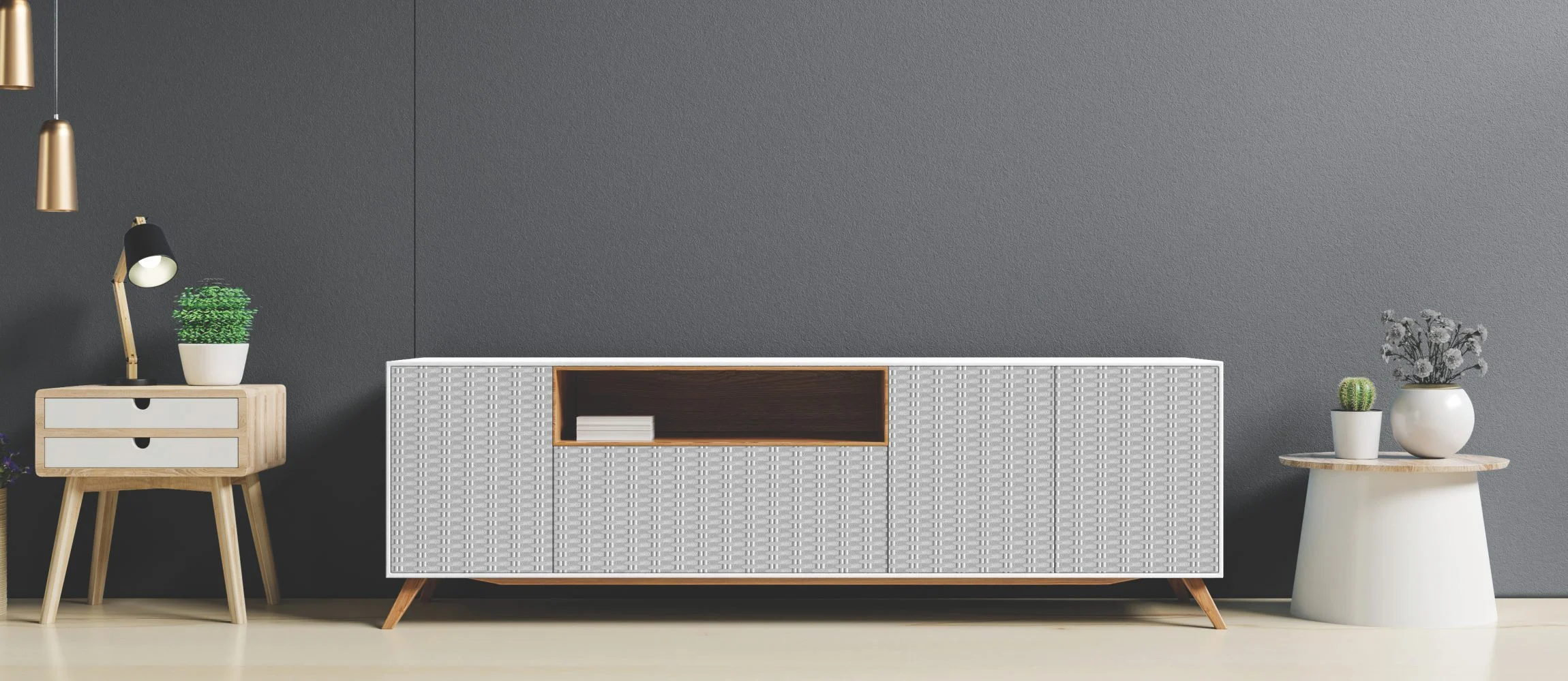 Modern white media console with textured doors positioned against a dark grey wall in a minimalist living room.